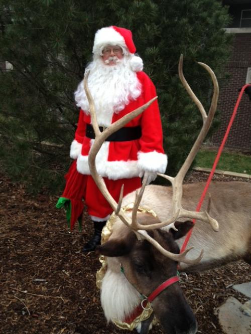 Lockett as Santa with his reindeer